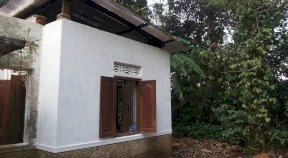Safe, clean painted house for an old man in Sri Lanka